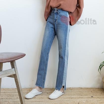 Two-toned Straight Leg Jeans Featuring Frayed And..
