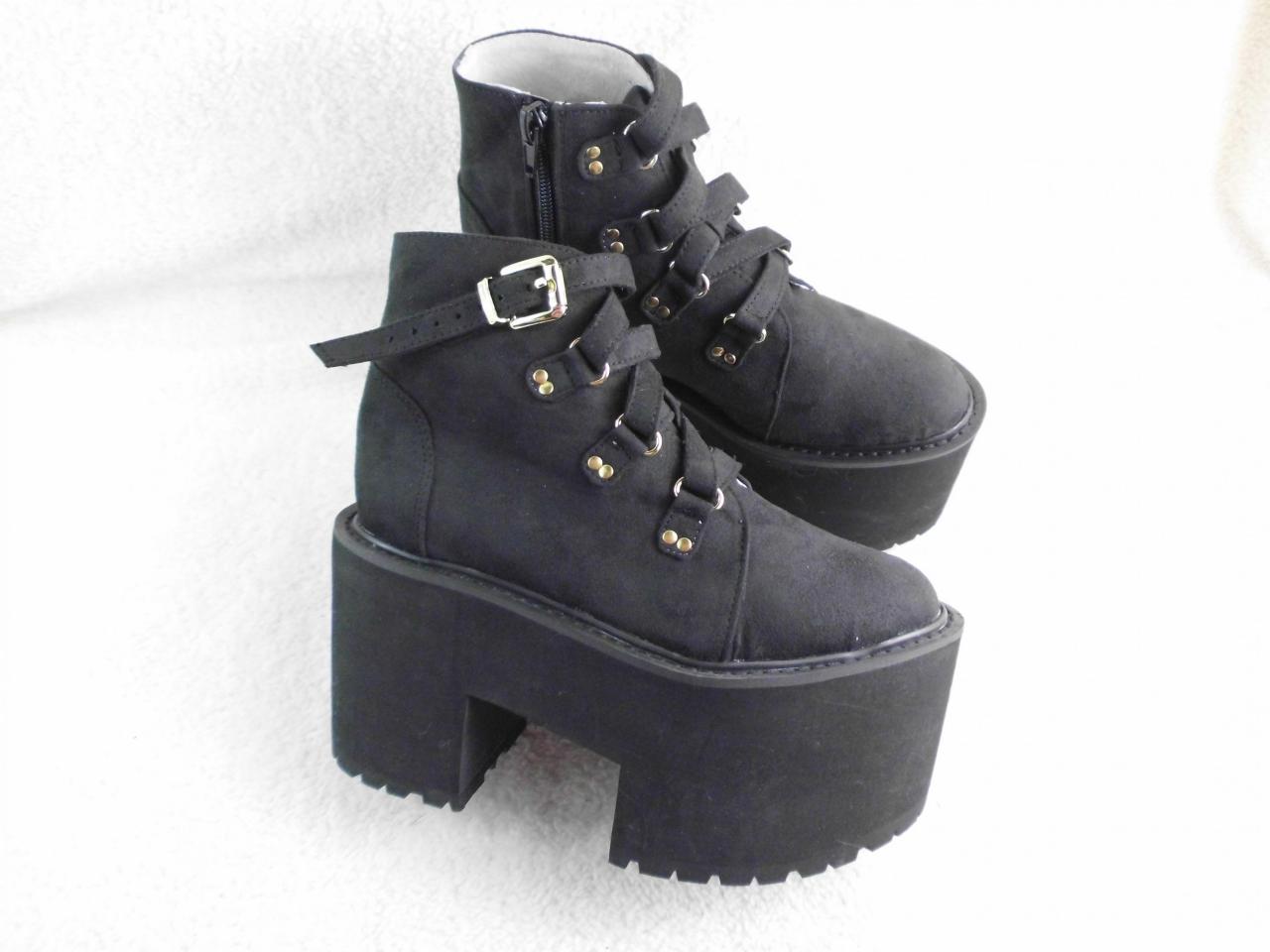 Women High Platform Cleated Sole Boots With Criss-cross Straps And Zipper Closure